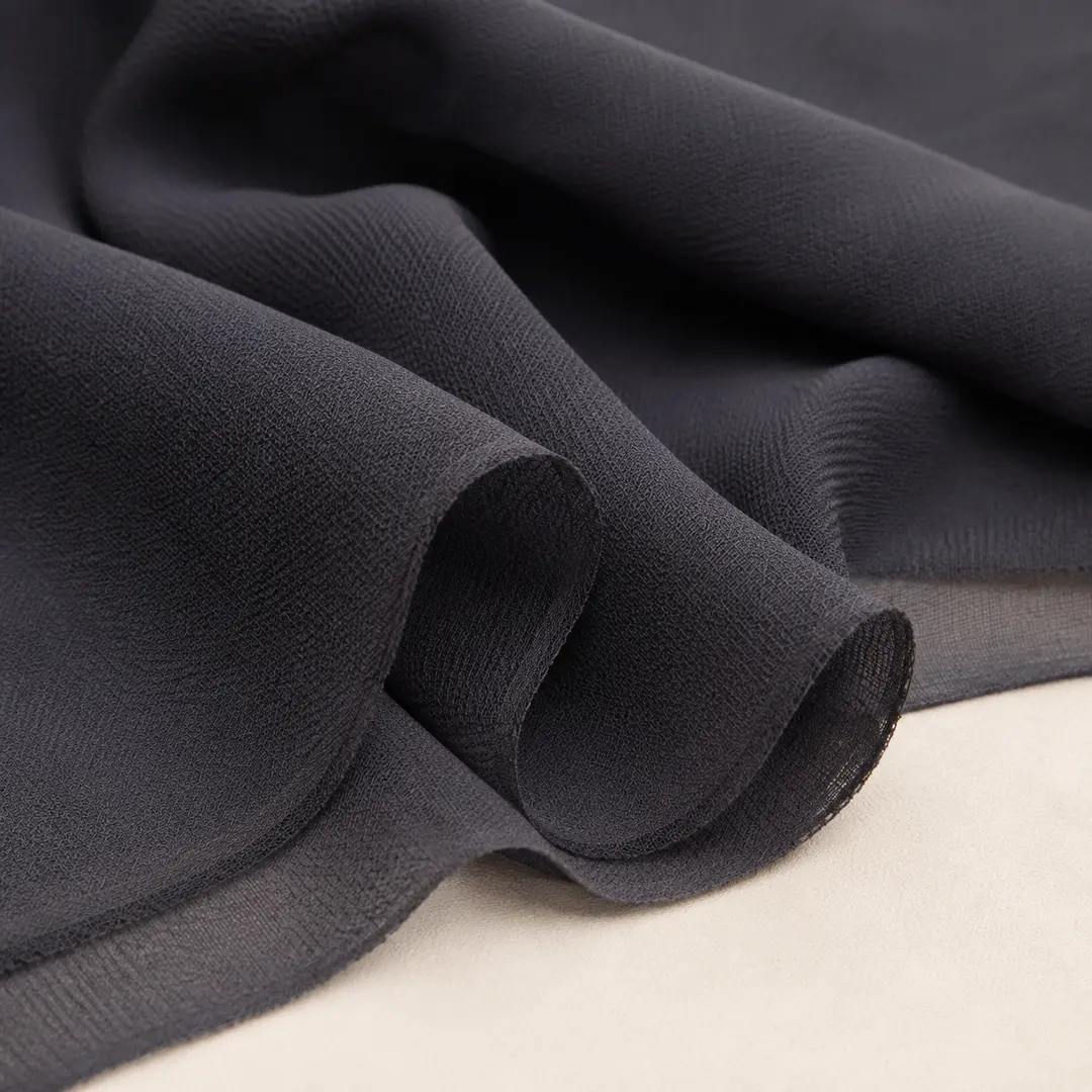 Detail tekstur Kain Babydoll Zara warna charcoal